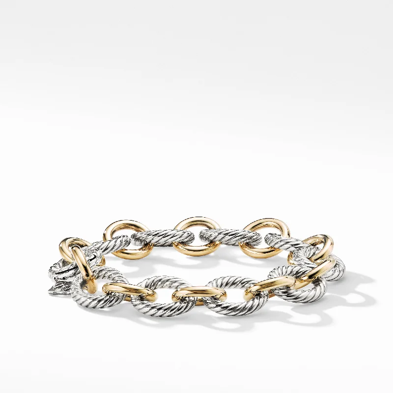 Bangles with bold onyx stones for contrast -David Yurman The Chain Collection Bracelet in Silver and 18-Karat Yellow Gold