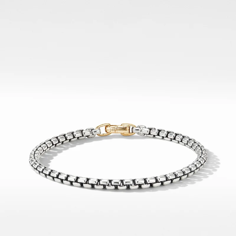 Bangles with rainbow moonstone for color play -David Yurman   Bracelet in Silver and 14-Karat Yellow Gold