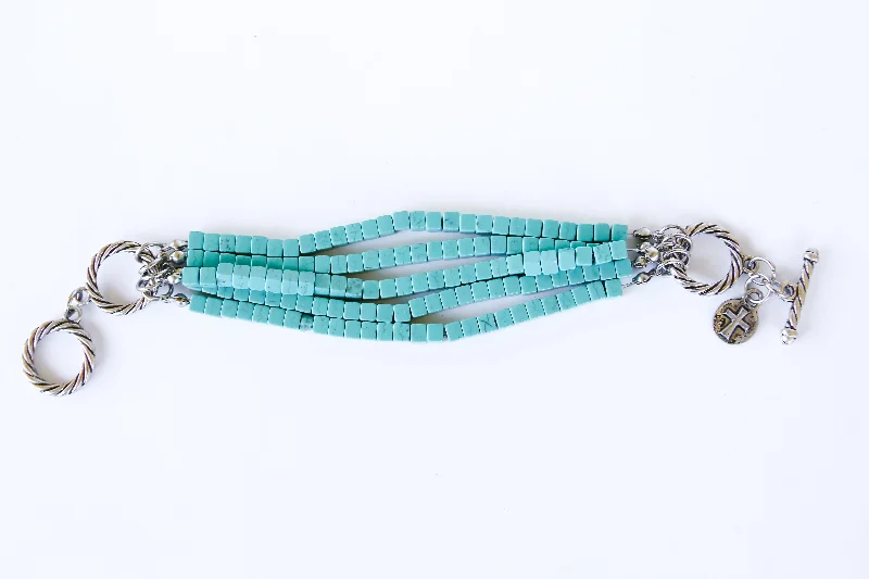 Bangles with twisted metal bands for flair -5 Strand Turquoise Bracelet