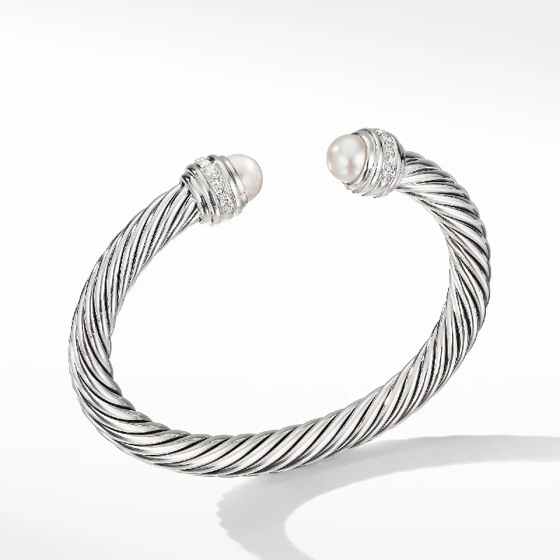 Vintage bangles with intricate filigree metalwork -David Yurman  Bracelet in Sterling Silver