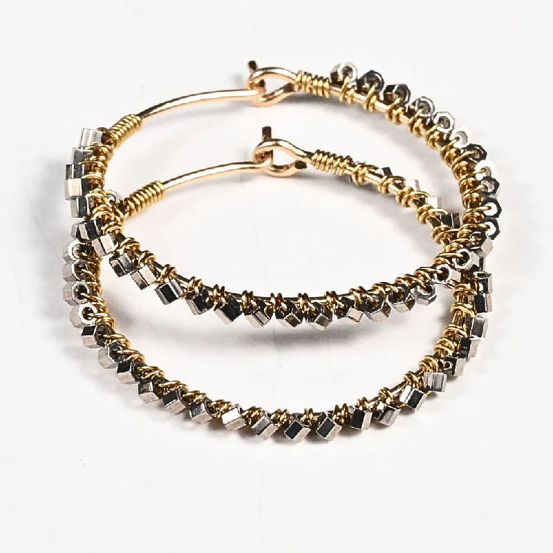 Hoop earrings with stacked layers for a bold and textured design-Cala Mini Hoop Solid Earrings