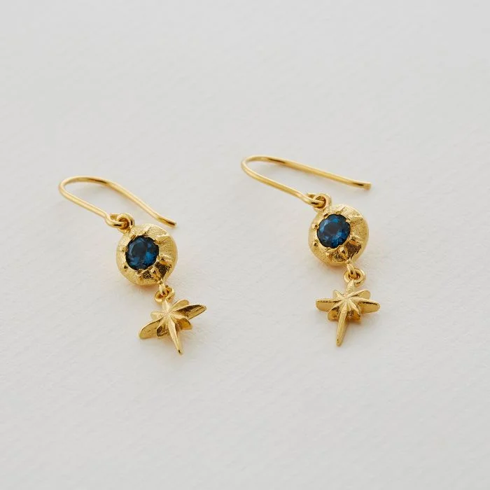 Hoop earrings with gold accents for a warm, elegant statement piece-Guiding Star Blue Topaz Hook Earrings