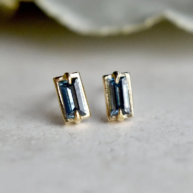 Hoop earrings with hearts for a sweet and romantic gesture-Nova Blue Sapphire Baguette Studs