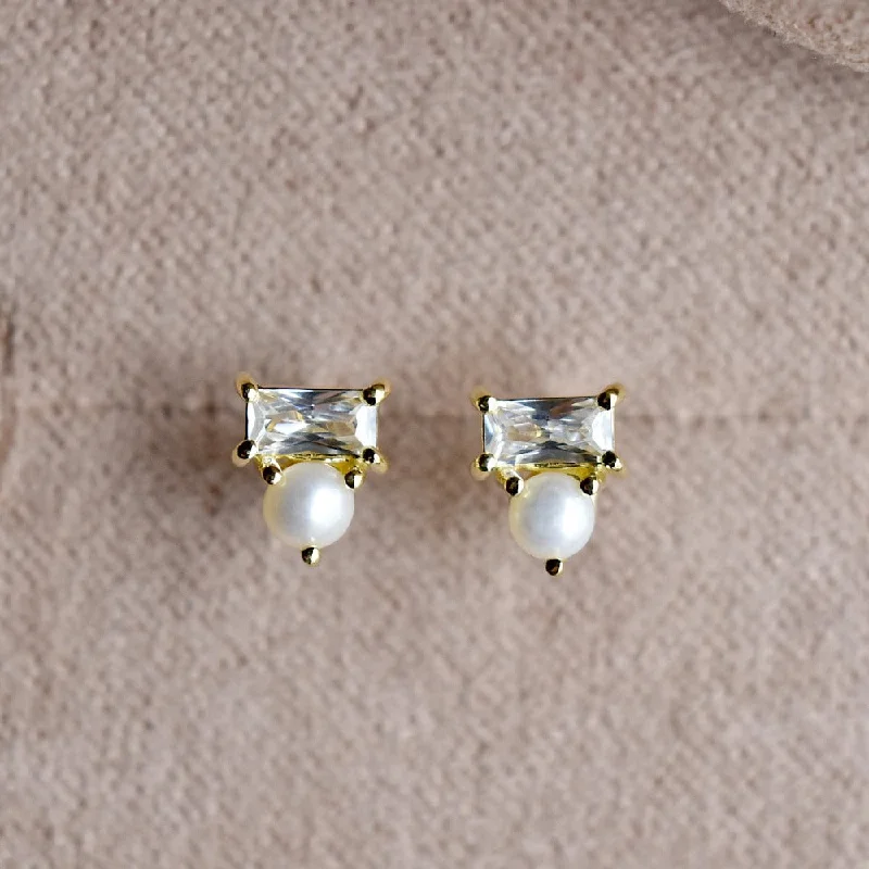 Hoop earrings with oversized designs for a bold, fashion-forward statement-Tiny Pearl & CZ Studs